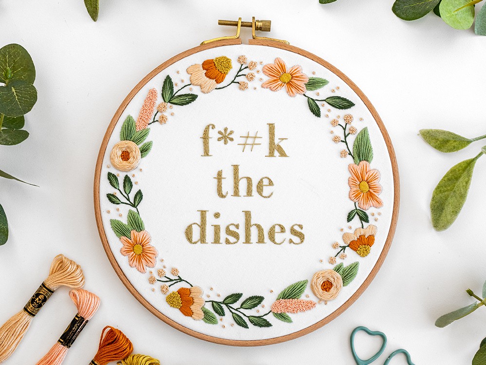 This is an image of the fuck the dishes embroidery pattern.