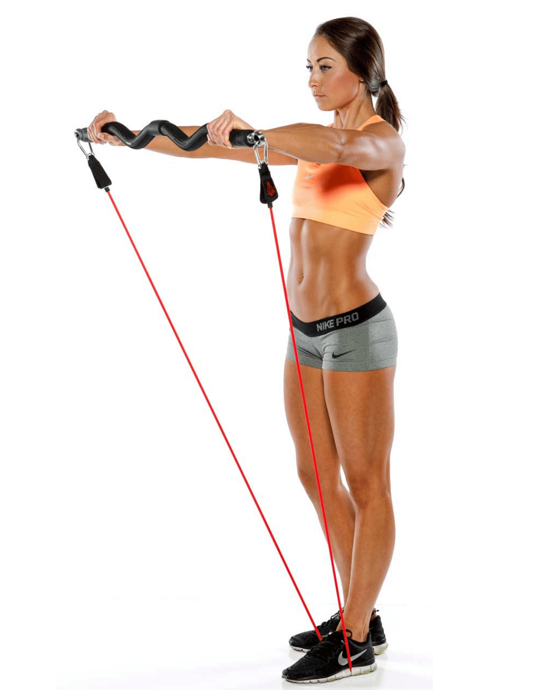 woman using xbar fitness resistance bands