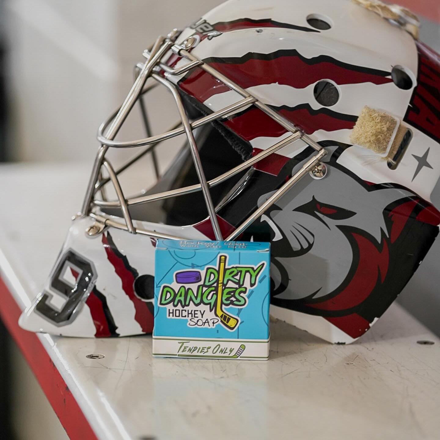 tendies only green jasmine lime hockey goalie soap on a bench with a red and white goalie helmet