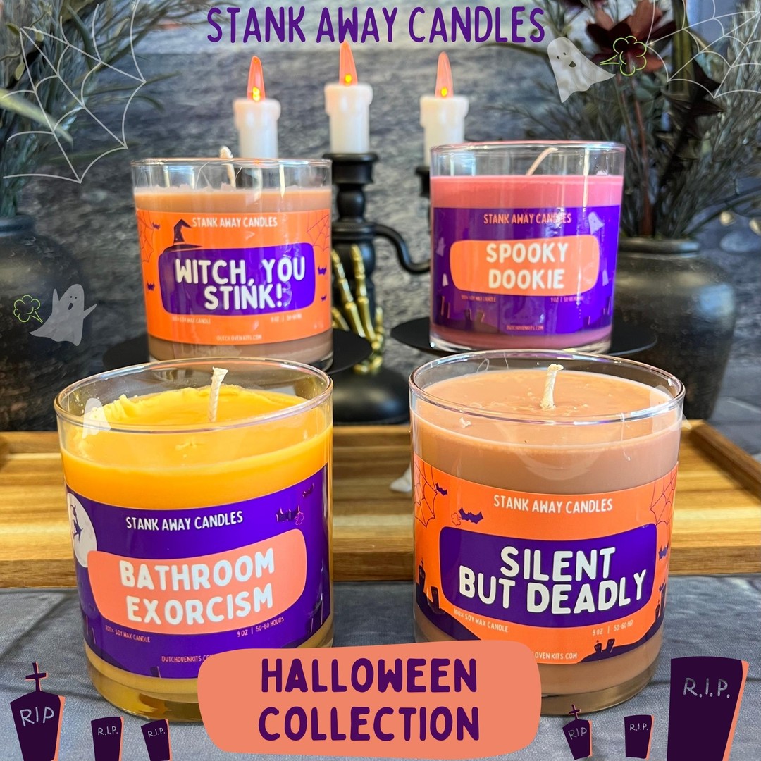 4 halloween candles on a halloween background.