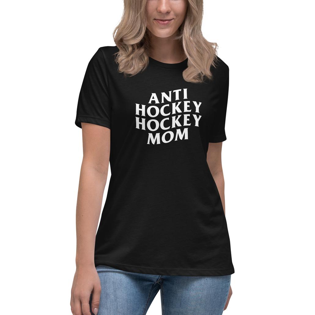 A woman in a black t shirt. Anti hockey hockey mom
