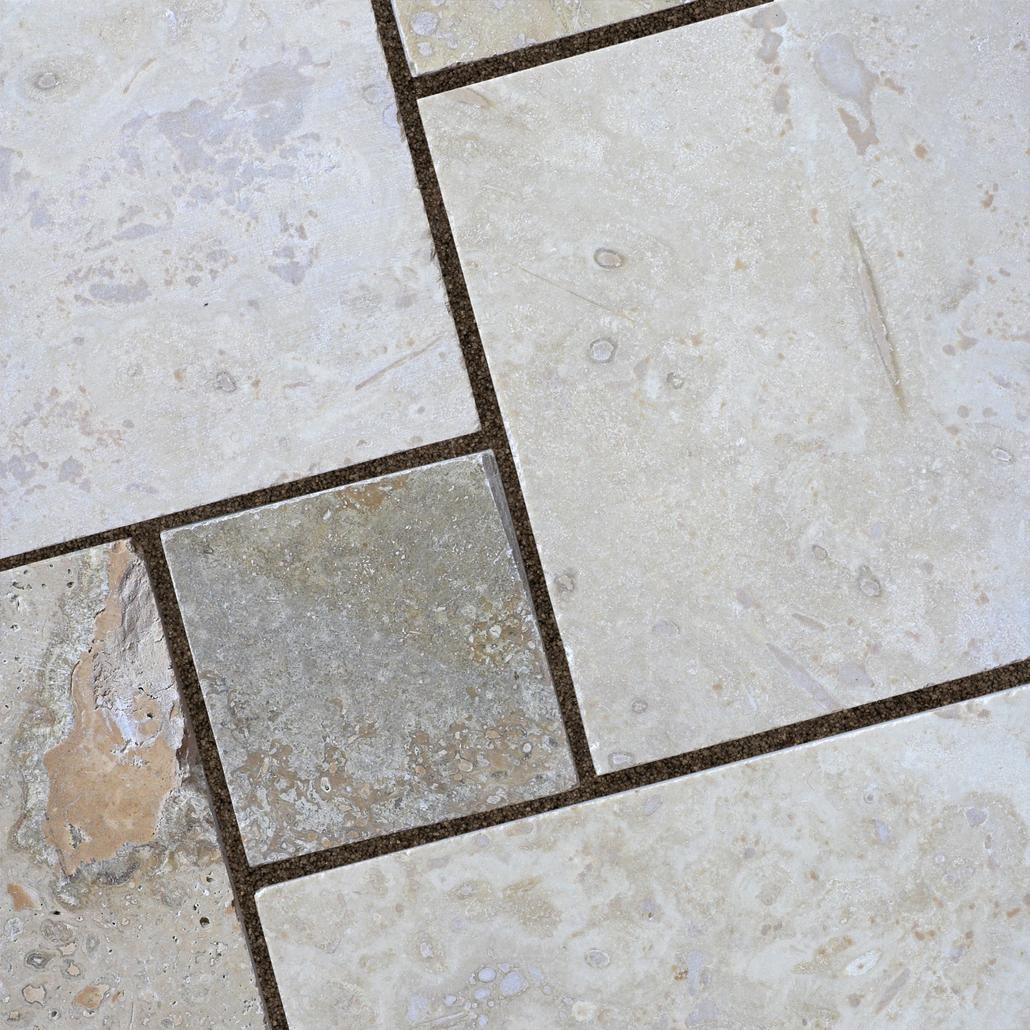 Charcoal gray inside of travertine joints