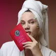 Model wearing and posing with Dim n Dazzle Sheet mask