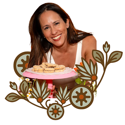 women with pink cookie stand and cookies