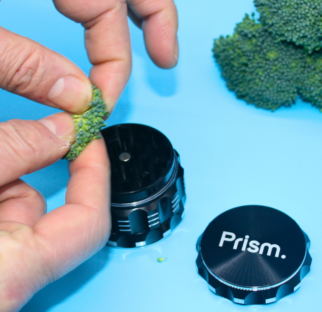 Comparison of hand breaking herbs vs using a precision herb grinder, illustrating why manual prep leads to uneven chunks while a quality shred ensures better airflow and even combustion.