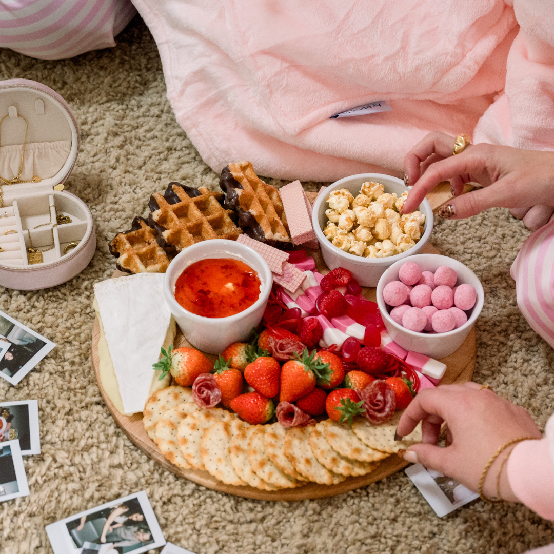 A pink themed grazing board for valentines day