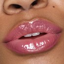 Medium skin tone model lips with Berry Pout