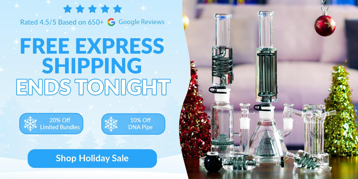 glass bongs on table in front of couch