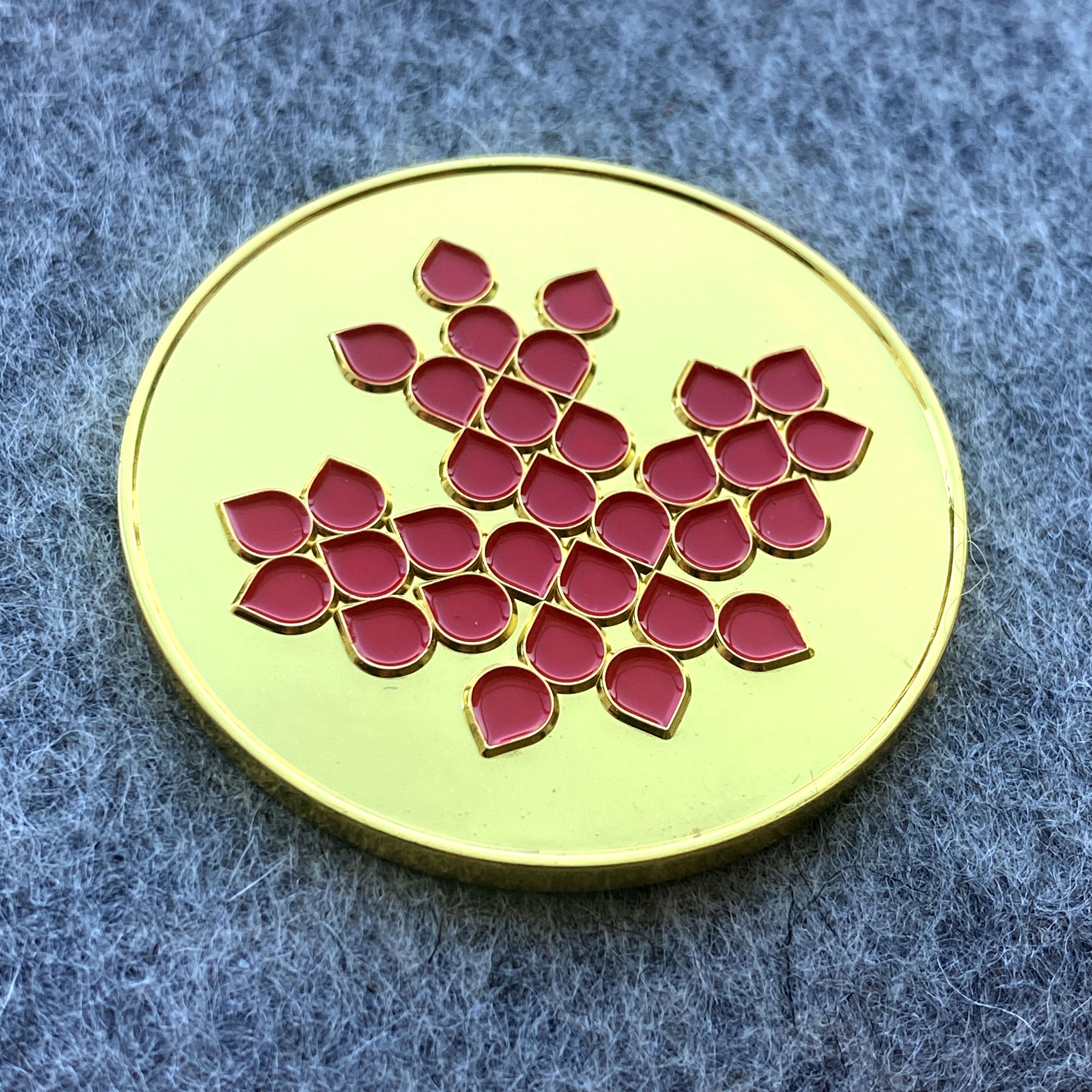 custom gold coin with red maple leaf