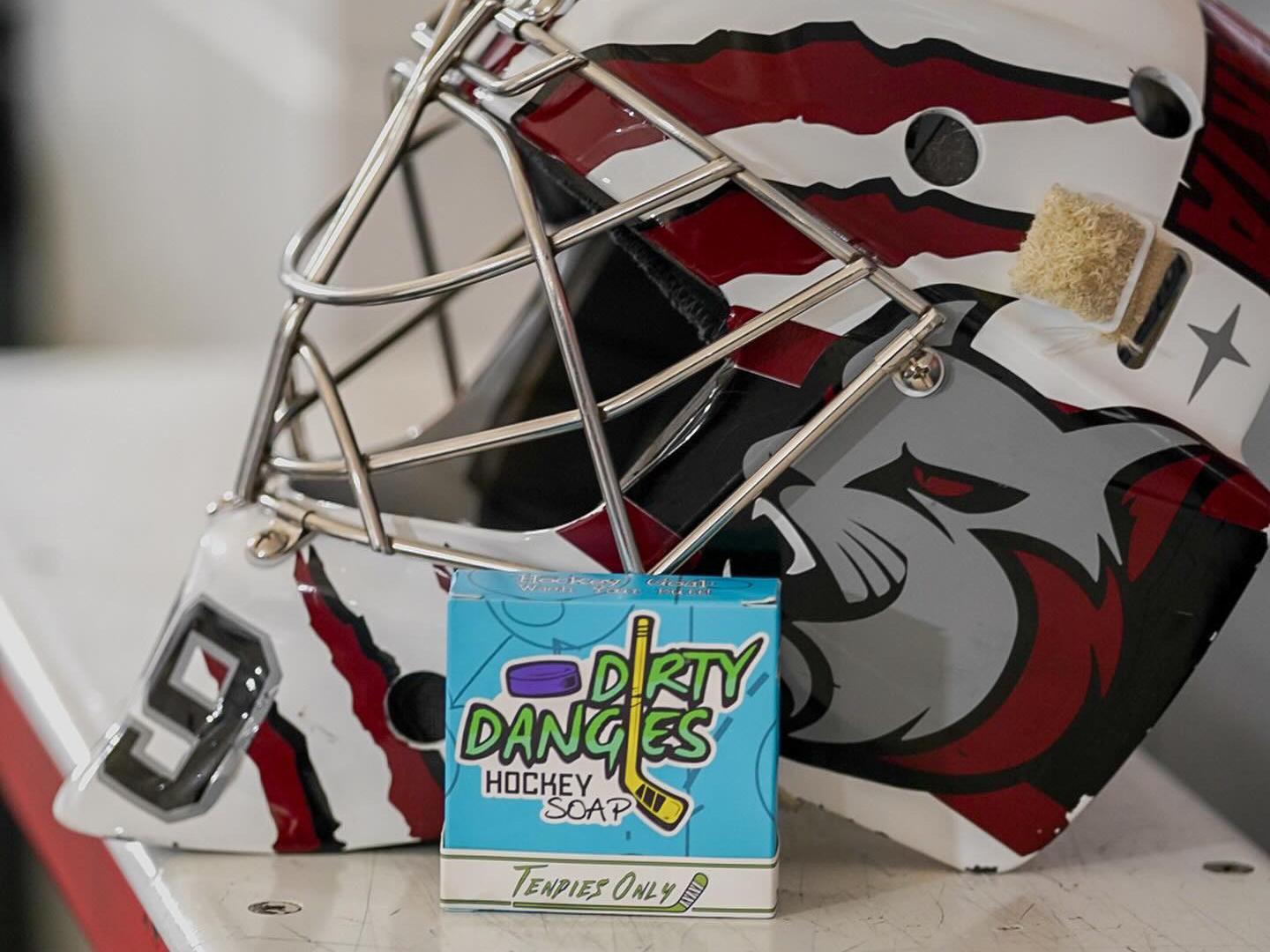 tendies only green jasmine lime hockey goalie soap on a bench with a red and white goalie helmet
