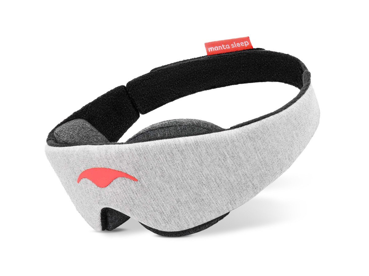 A light gray sleep mask with eye cups for night shift workers.