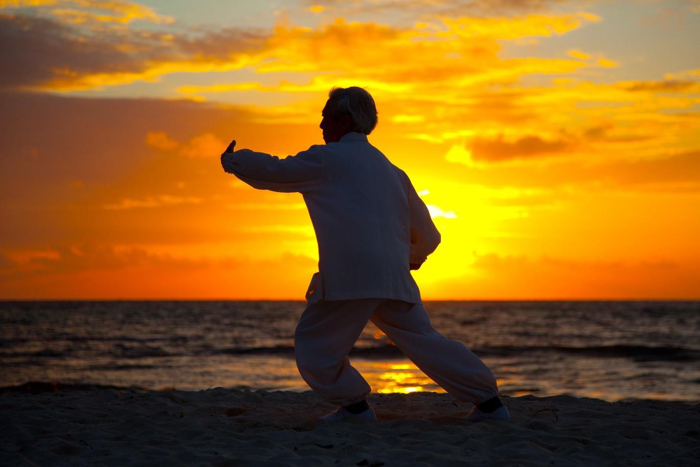 Tai chi men sunset sea ocean
