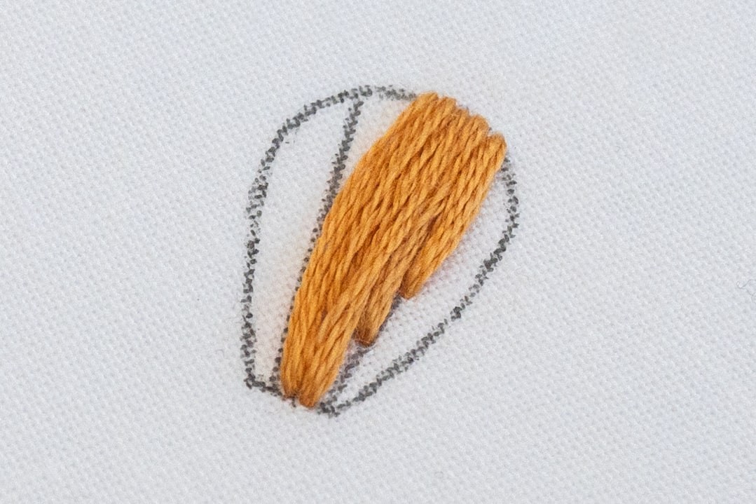 An area of tapered satin stitch has been created.