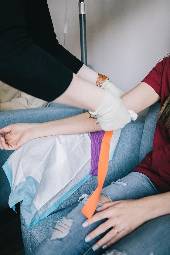 Nurse wrapping arm