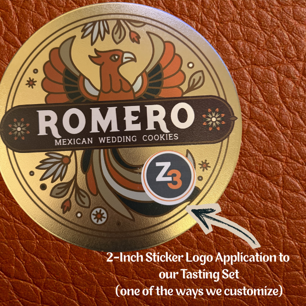 romero cookie tin with 2 inch sticker logo example