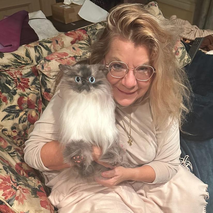 Customer with handmade stuffed animal