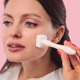 woman using derma stamp