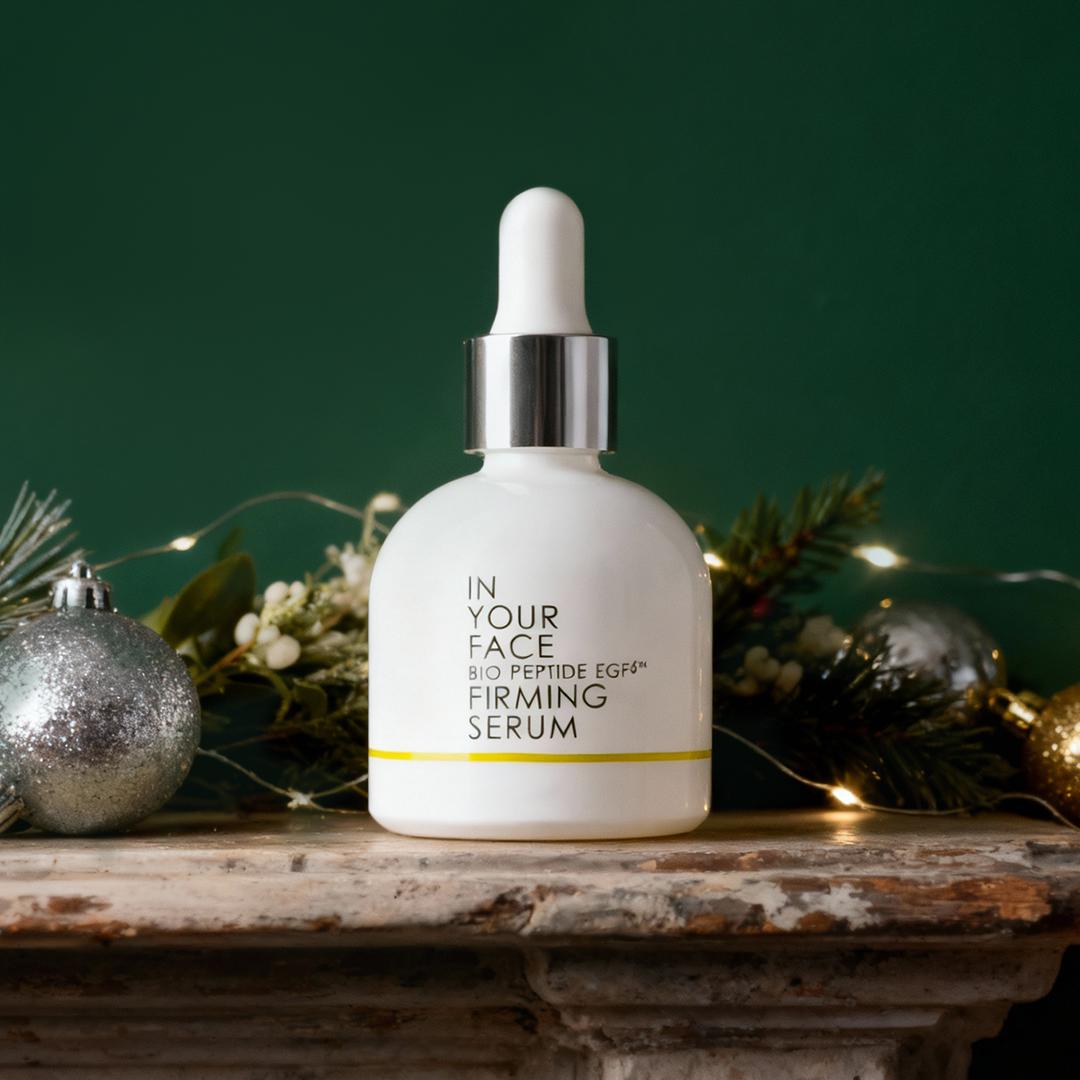 BIO PEPTIDE EGF6 FIRMING SERUM on mantel with holiday decor