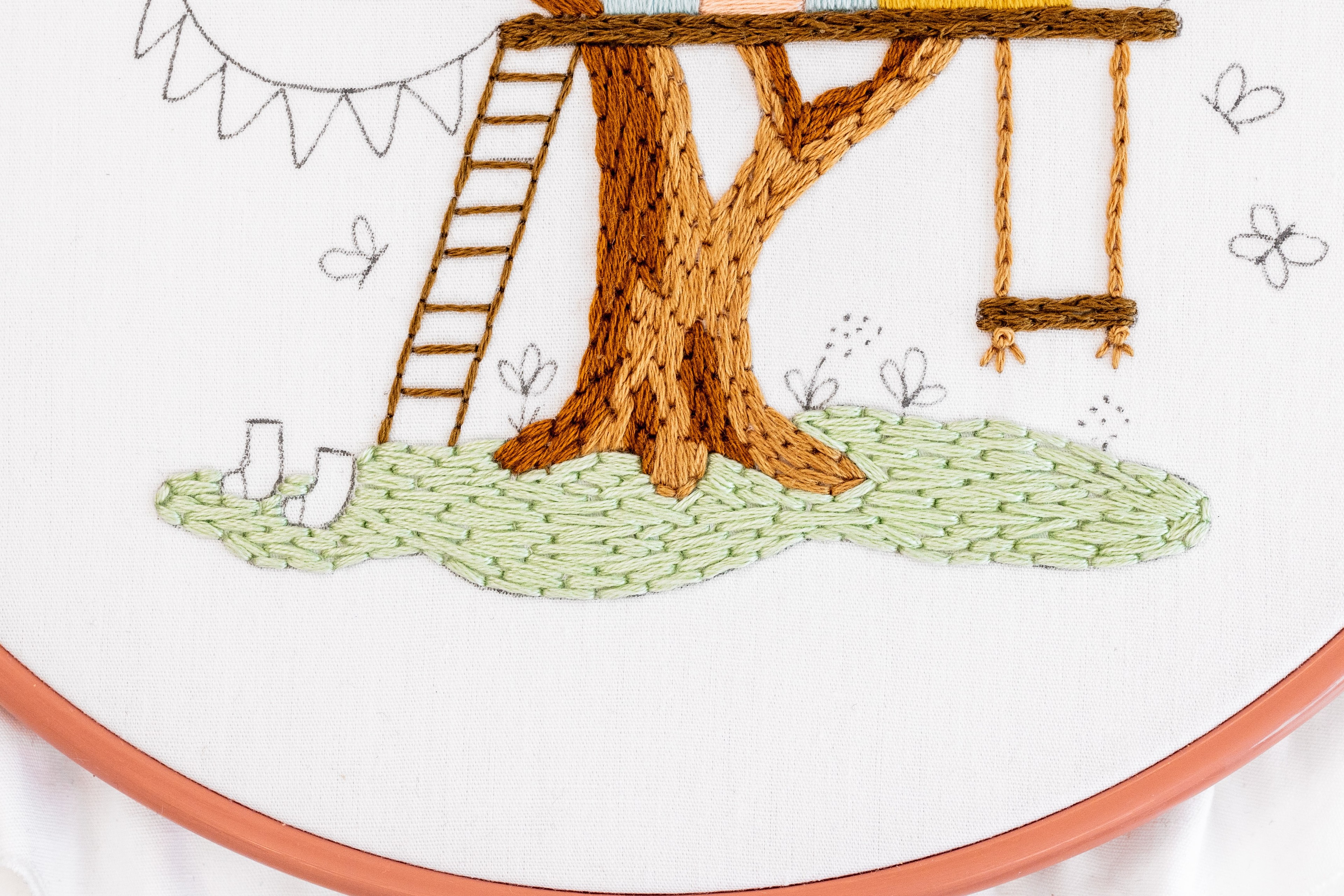 This is an image of the stitched grass in The Treehouse pattern by Clever Poppy.