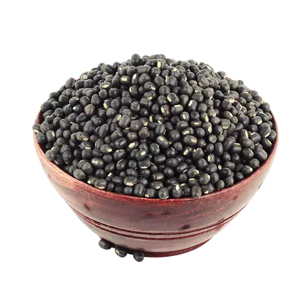 A bowl of black grams surrounded by floral artworks