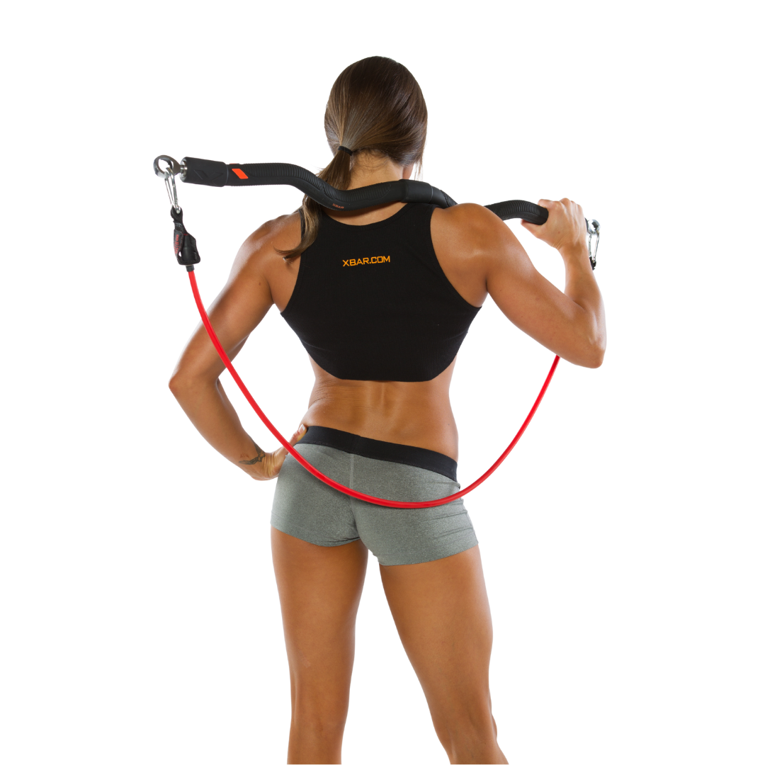 woman with her back turned holding the xbar fitness bar and resistance band