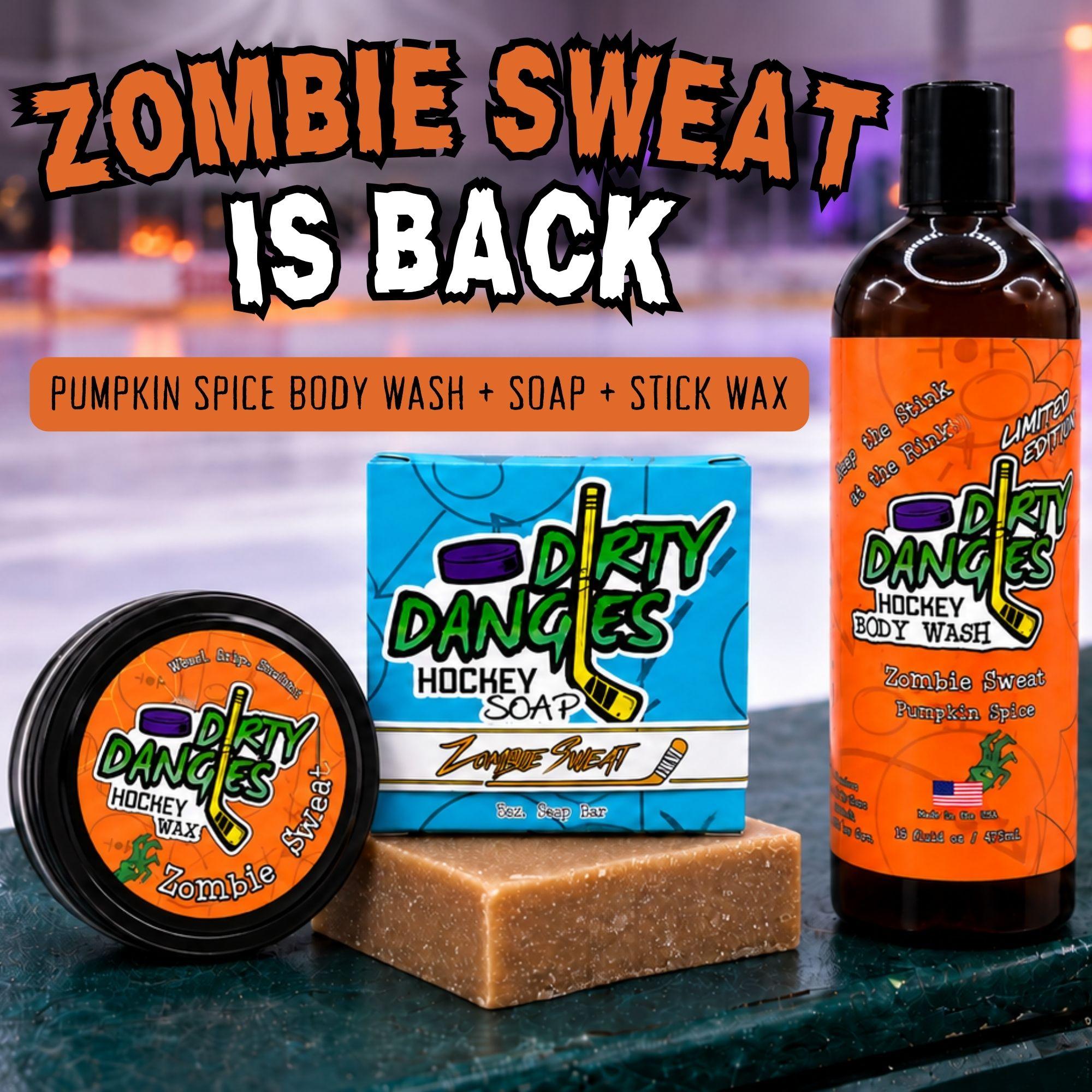 dirty dangles zombie sweat pumpkin spice scented bundle stick wax soap bar and body wash on hockey boards with halloween decor in the background