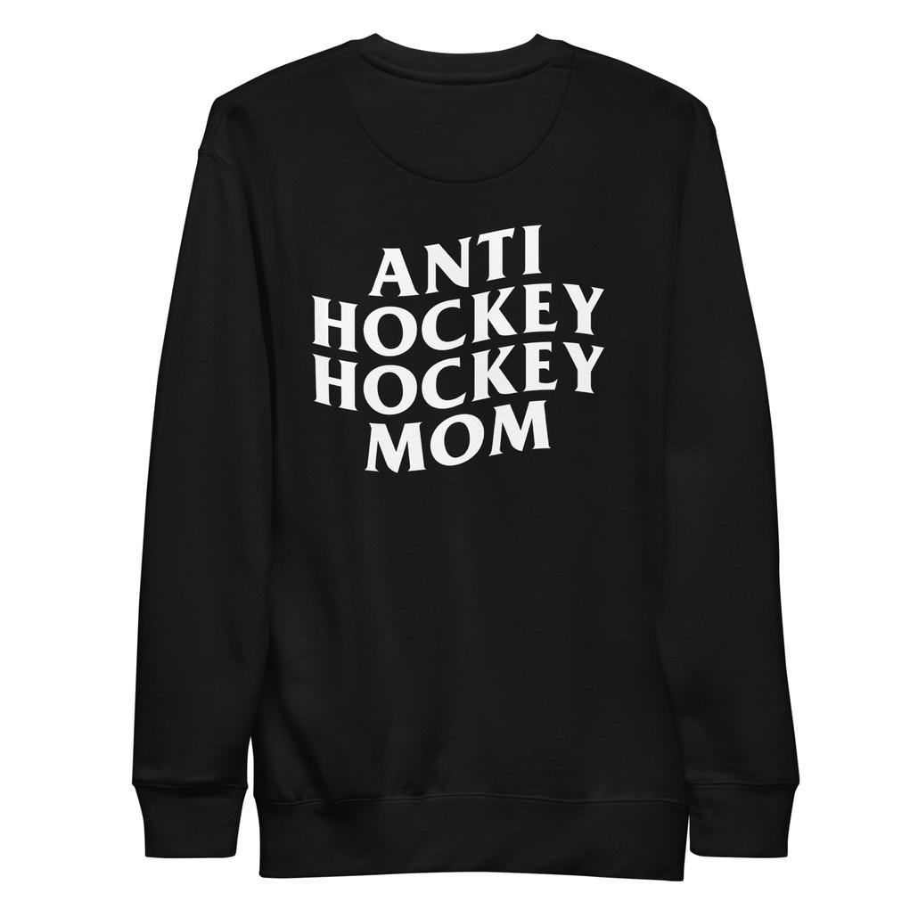 the back of a black pullover hoodie sweatshirt with a skeleton drinking a beer while sitting in a cooler of ice. beer league liability dirty dangles hockey est 2023. white background