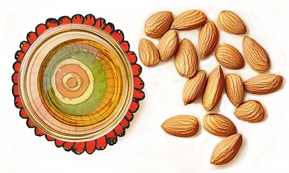 Almond oil, in a transparent glass bowl, kept on an artwork of a flower, with almonds on the side