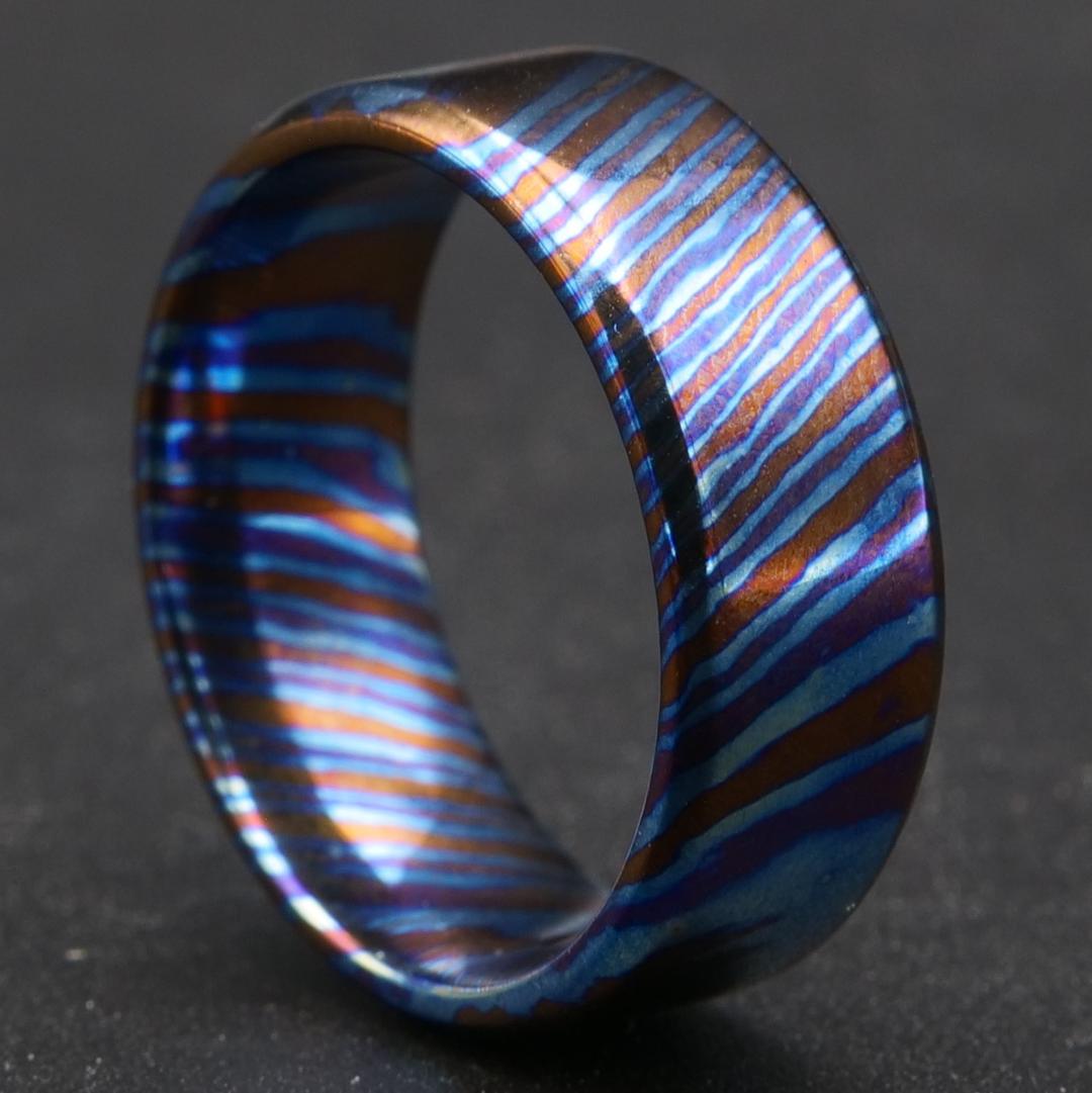 Heat anodized damascus ring