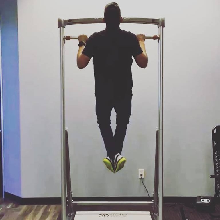 assisted pull up with adjustable height exercise bar