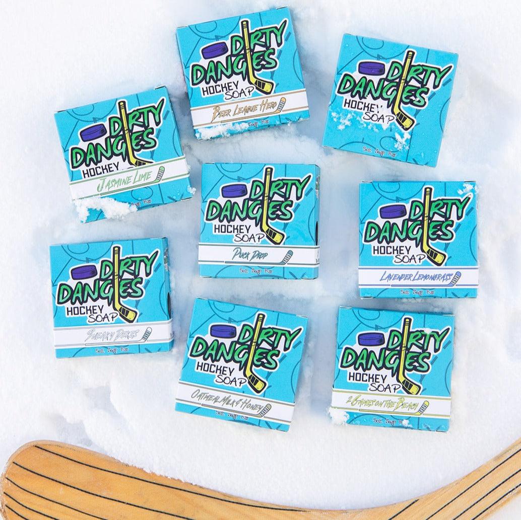 hockey soap bars in the snow with a hockey stick