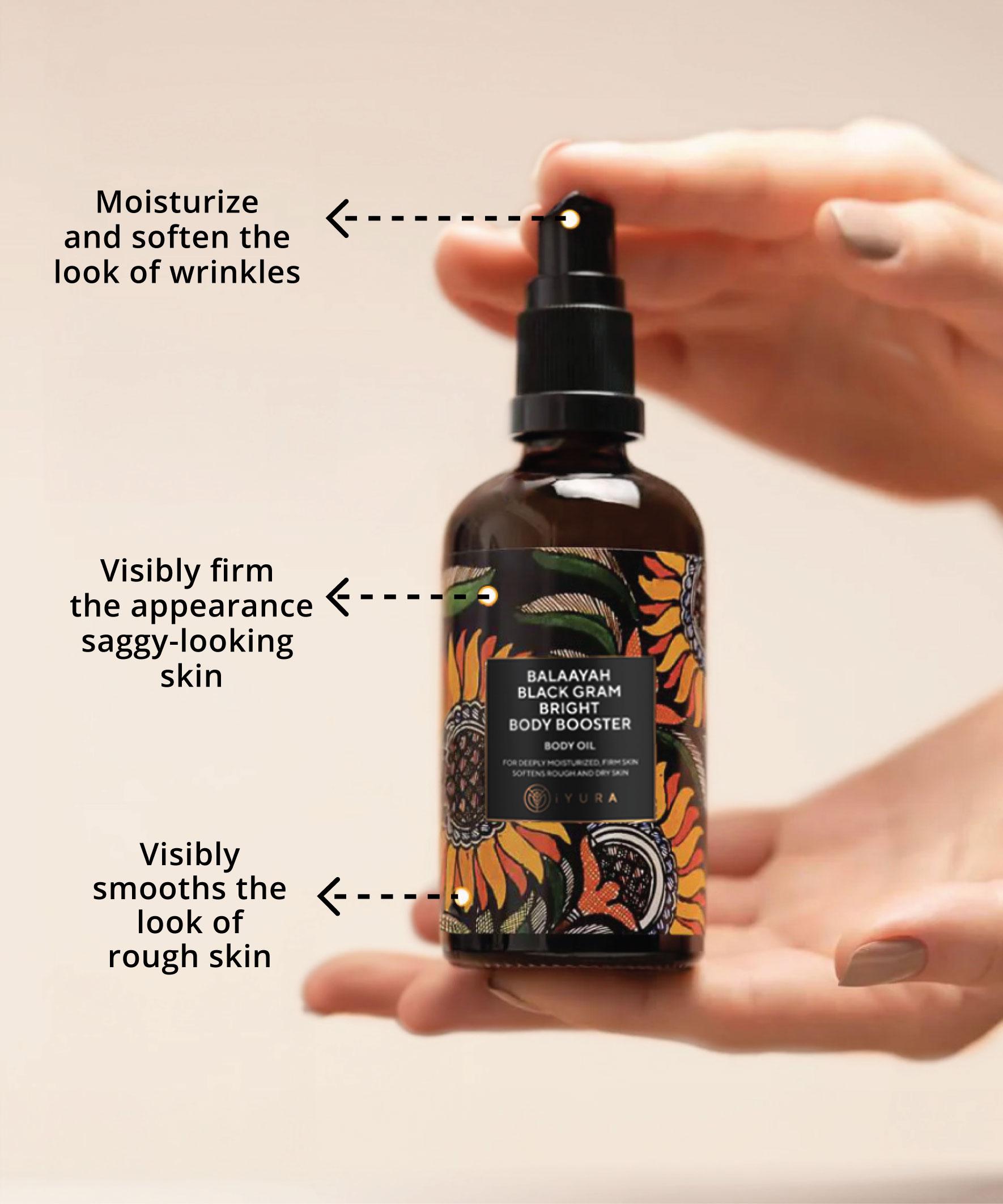 hand holding balaayah bottle showing various benefits