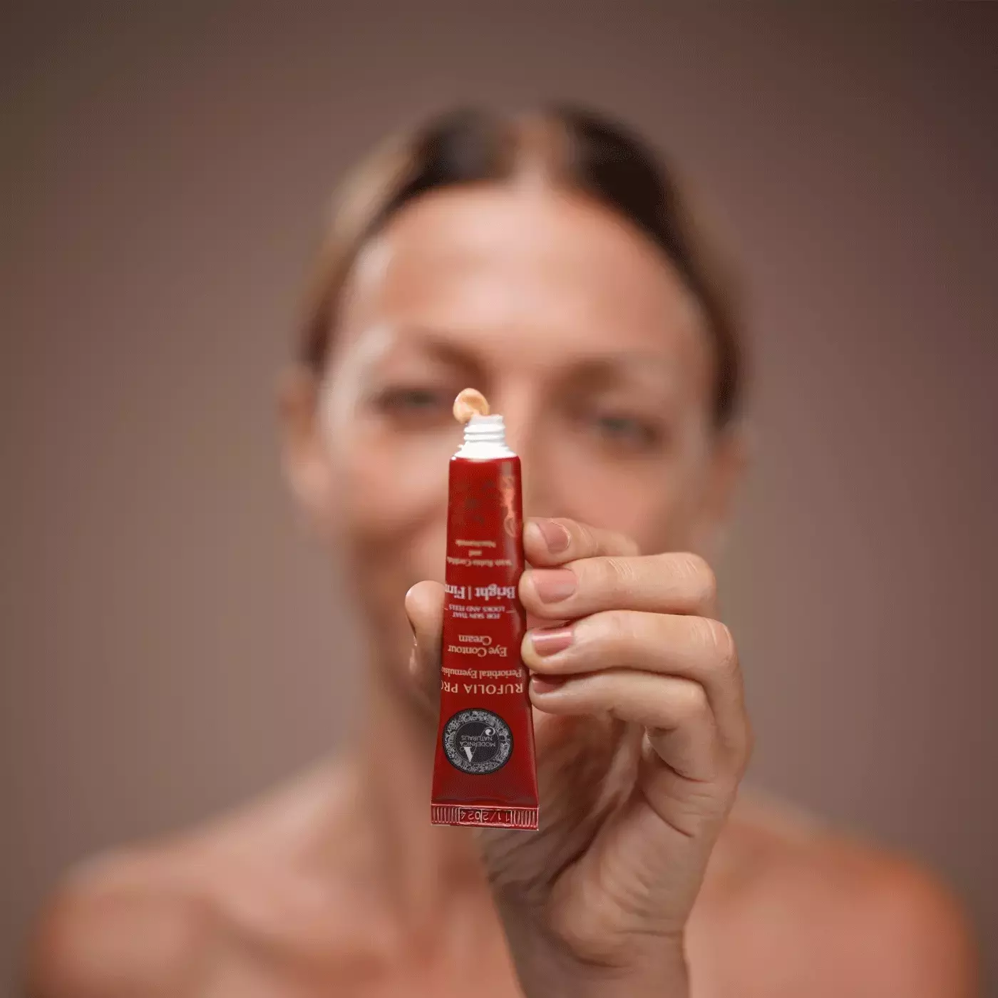 Woman applying Rufolia Pro