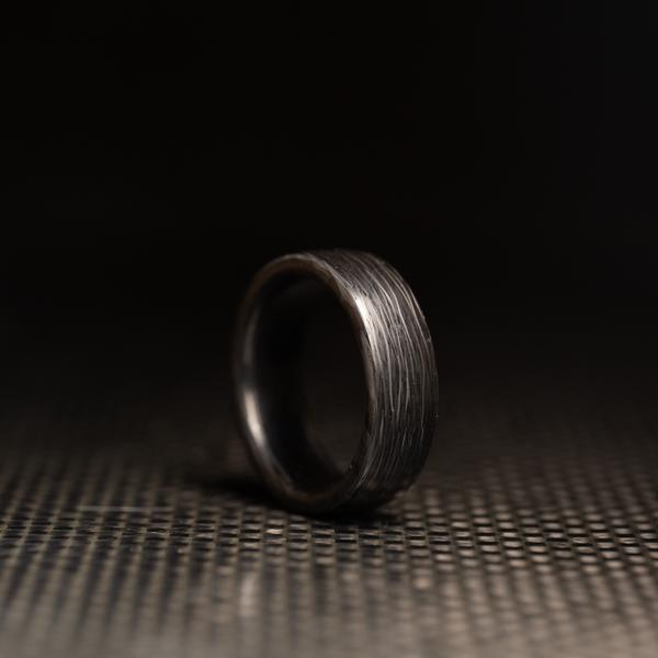 Flat mens carbon fiber ring.
