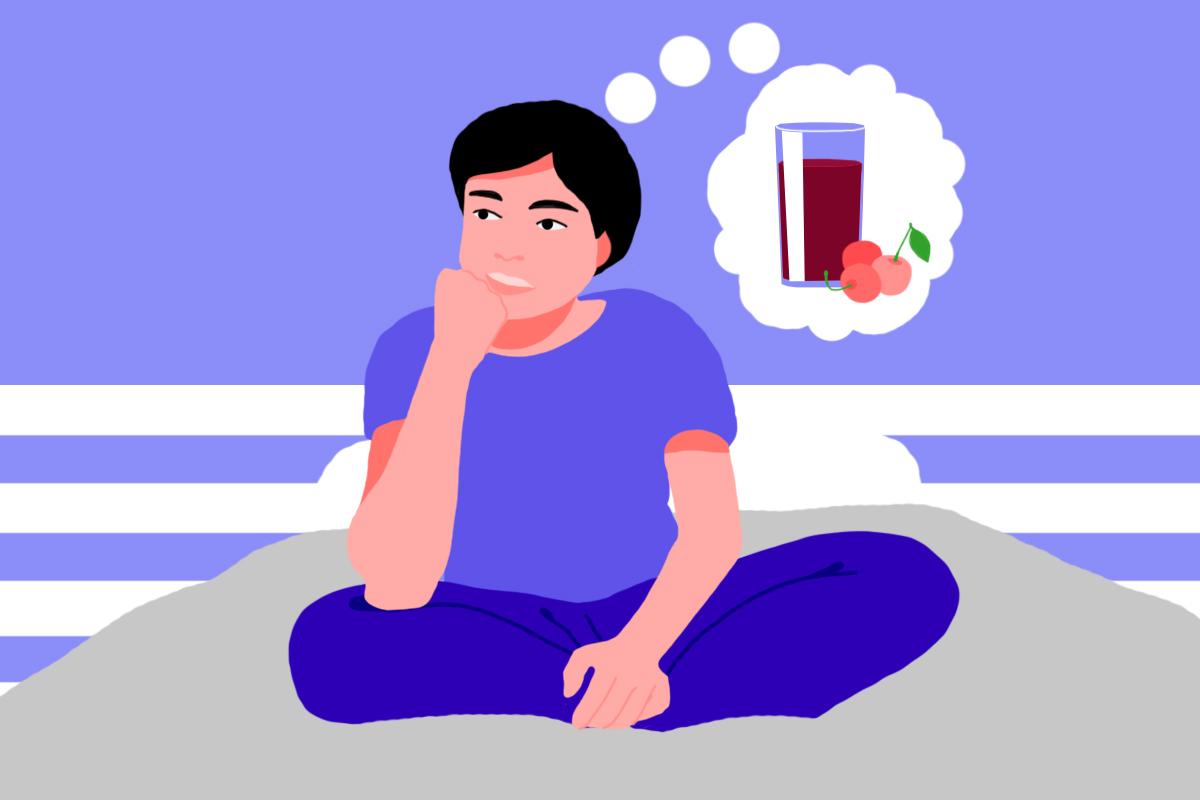 A man sitting on his bed pondering why does tart cherry juice help you sleep.