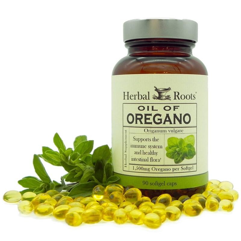 Herbal Roots Oregano Oil with golden gel caps and fresh oregano