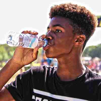 Guy drinking water