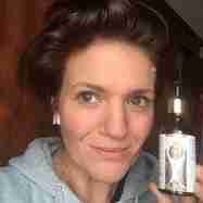 Audrey with a bottle of her Manjish Glow Elixir