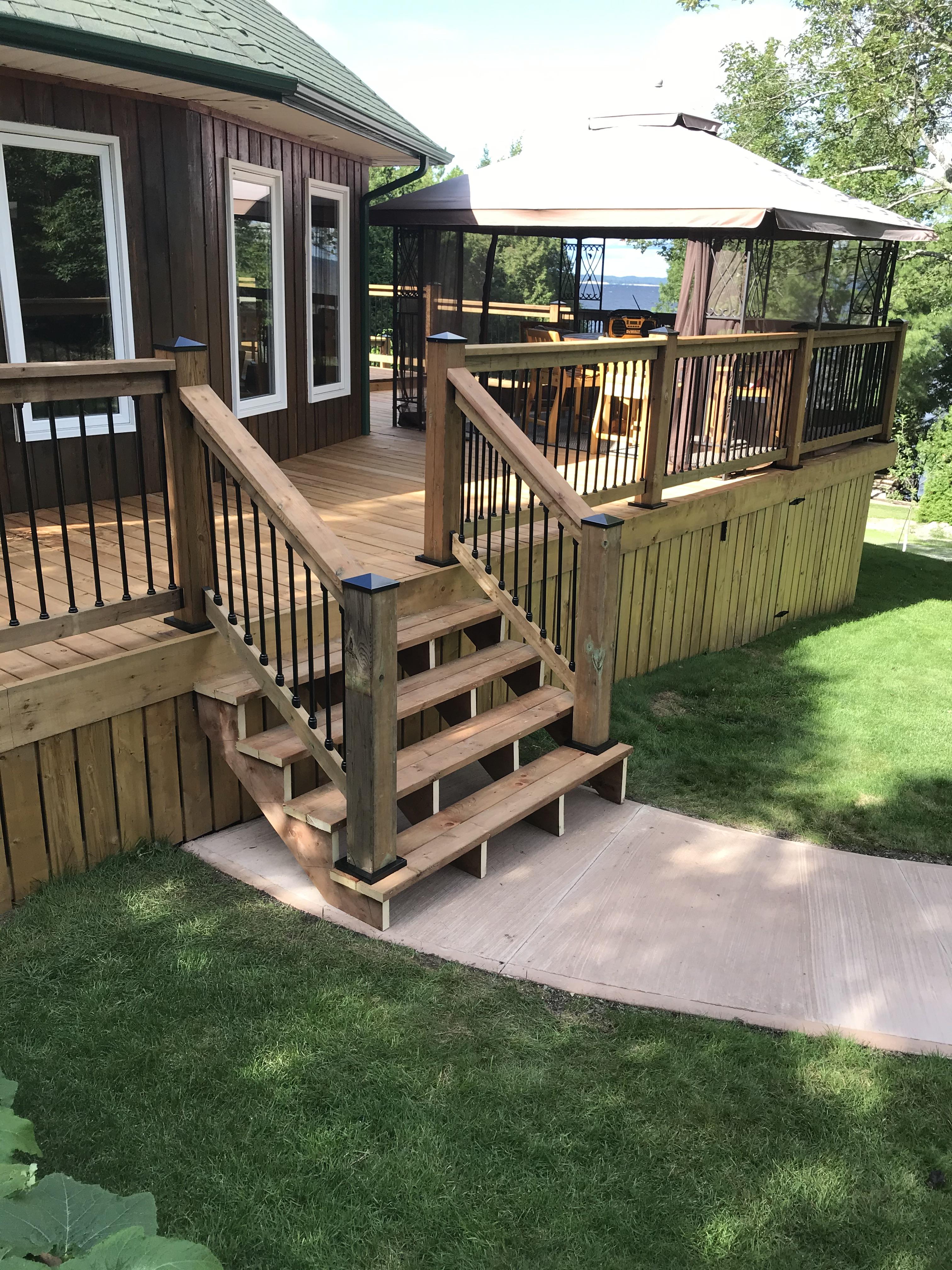 framed deck attached to pool