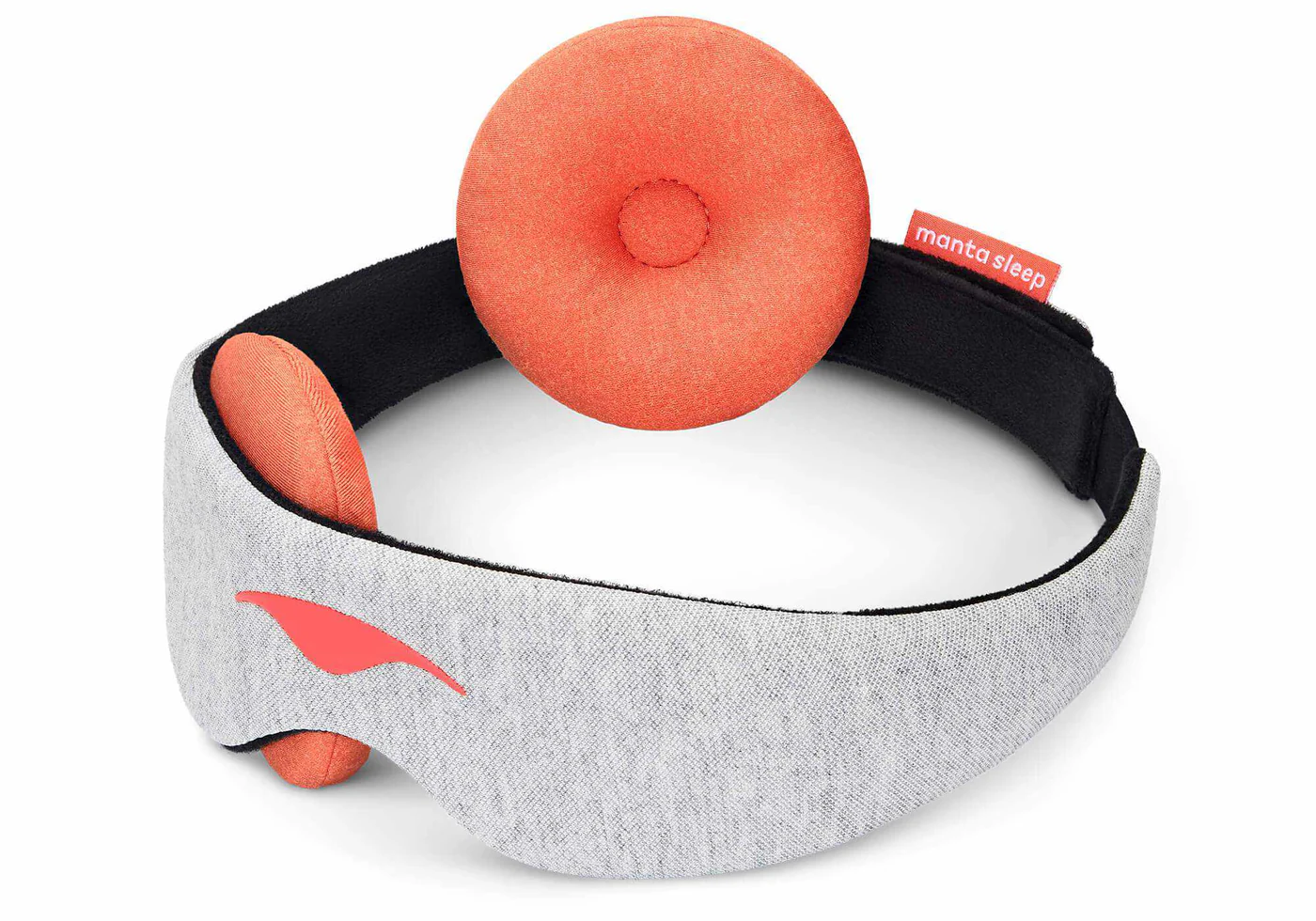 A light gray sleep mask with an orange warming eye cup attached to the front and another eye cup on the black strap.
