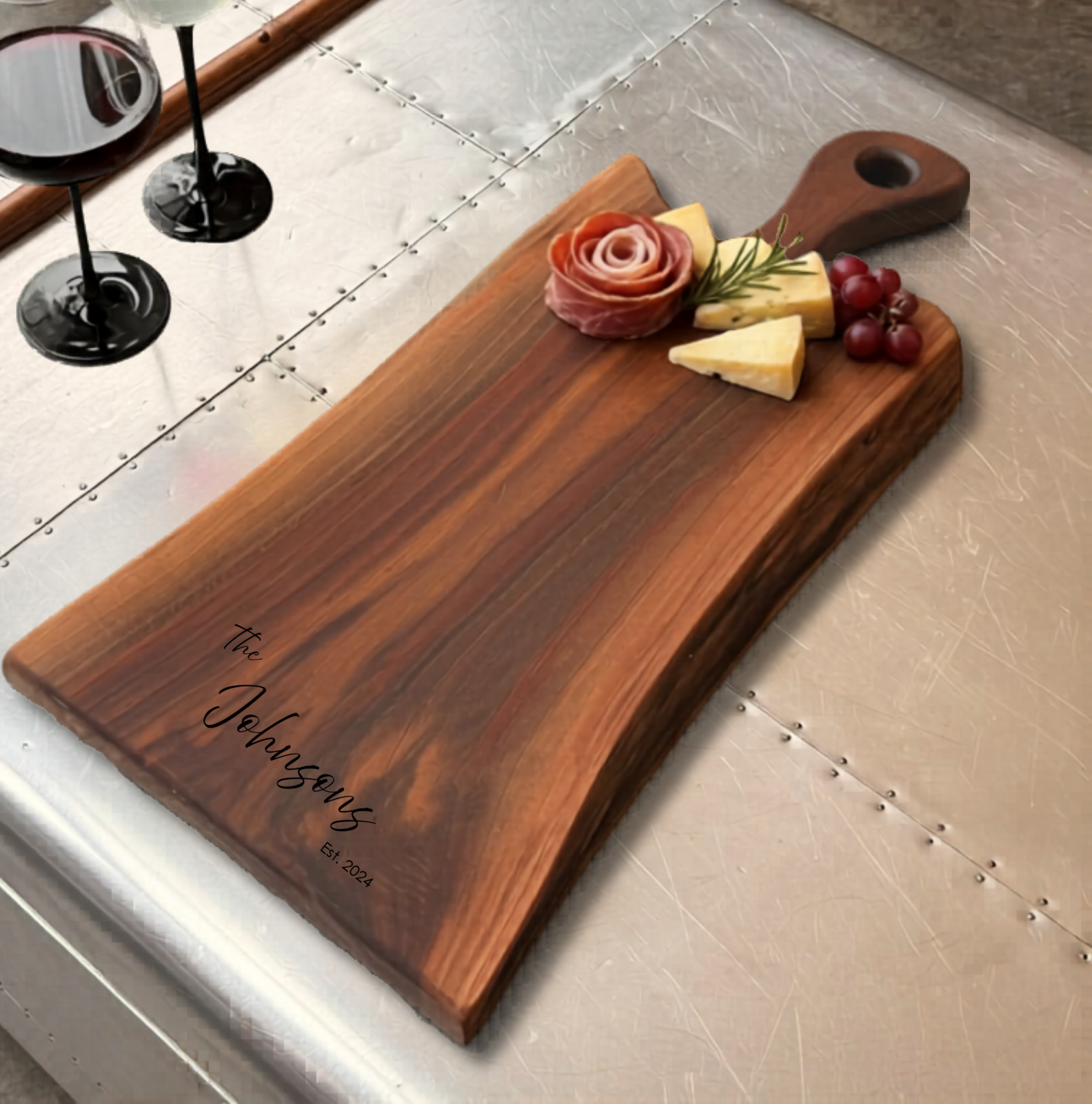 Personalized live edge charcuterie board with carved handle.