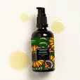 A few drops of Balaayah Black Gram Body Booster - Tea Garden Blend with it's bottle