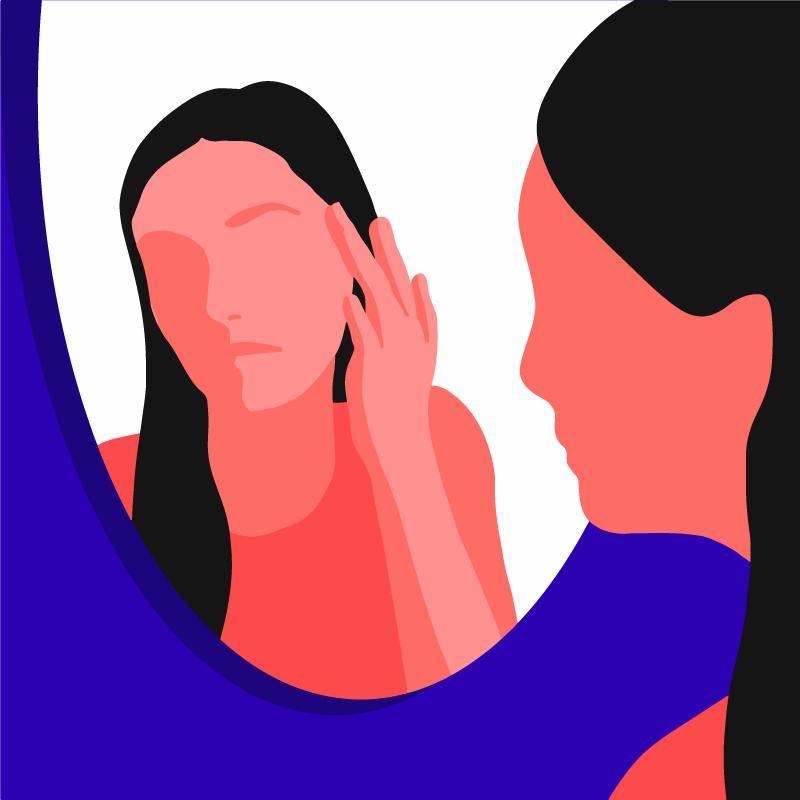 A girl looking in the mirror, examining her eye area for wrinkles.