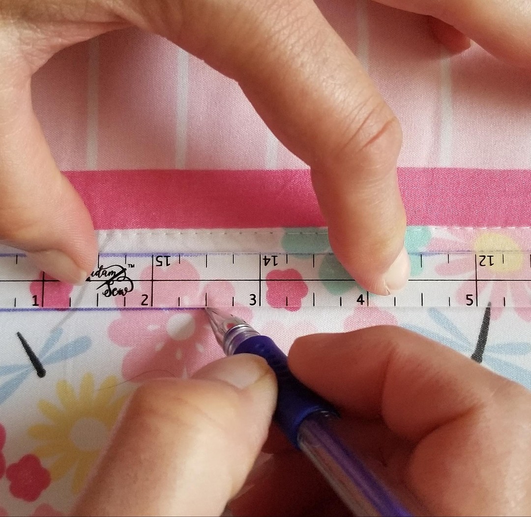 Making 1/2" mark on a quilt top using the Quarter Inch Patchwork Ruler "QIP"