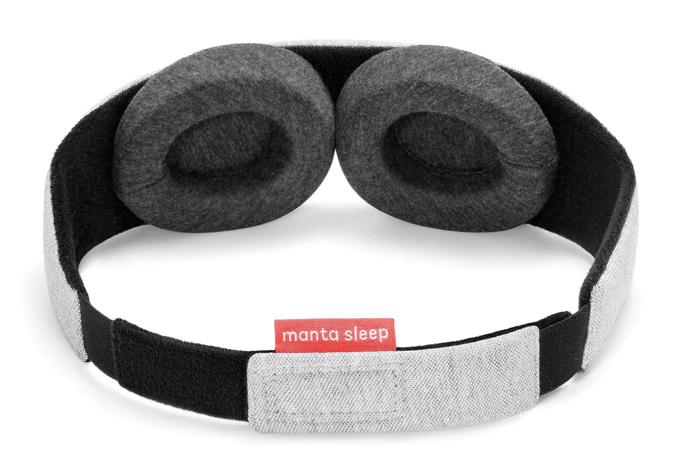 The black interior of a sleep mask with 2 dark gray eye cups.