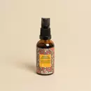 A bottle of Prinourish kept on a beige color background