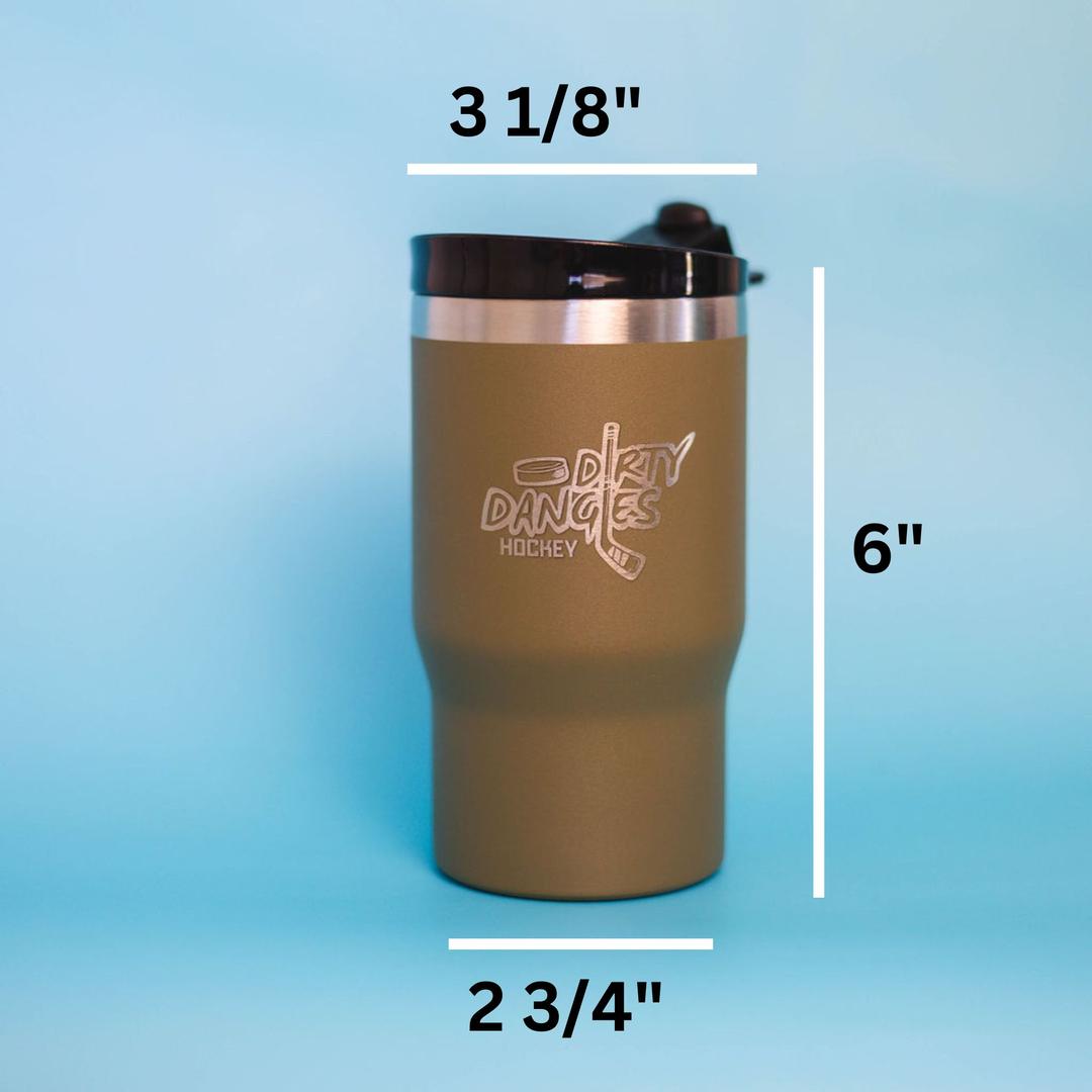 A green dirty dangles rink ready tumbler on a blue background with it's dimensions. 6in tall, 3 1/8in at the top and 2 3/4in at the bottom