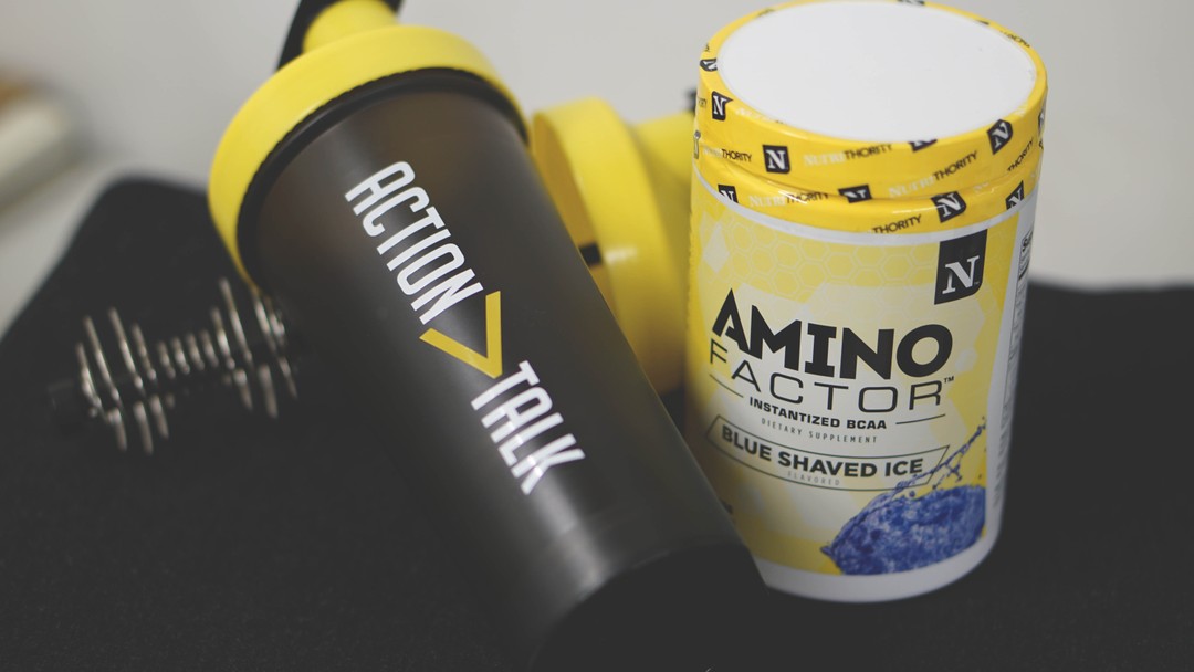 BCAAs branched-chain amino acids supplements and shaker bottle