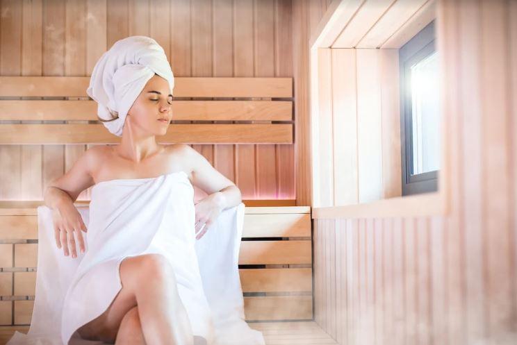 Relaxing in a small indoor sauna