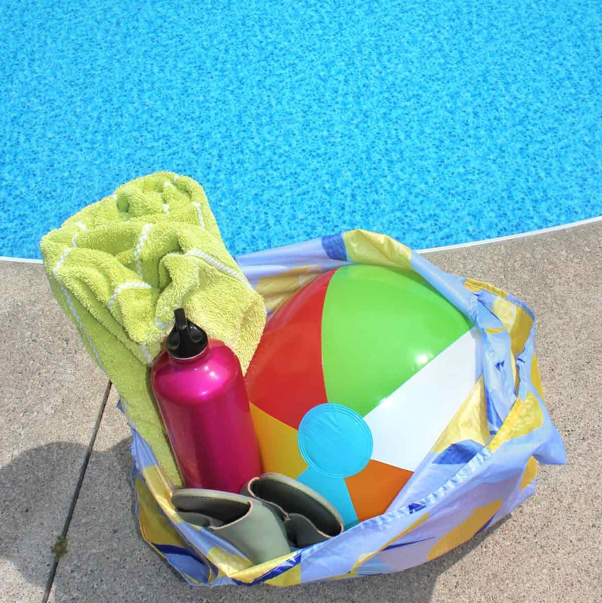 tote bag filled with beach supplies